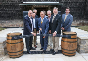 Tennessee Governor Bill Haslam, state officials, Master Distiller Jeff Arnett and representatives from Jack Daniel's celebrate the opening of the enhanced visitor experience at the Jack Daniel Distillery.